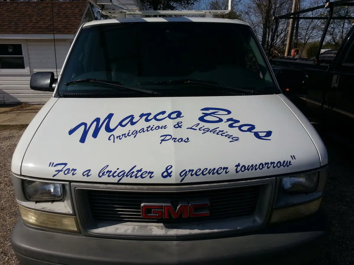Marco Bros work truck lettered for a brighter and greener tomorrow