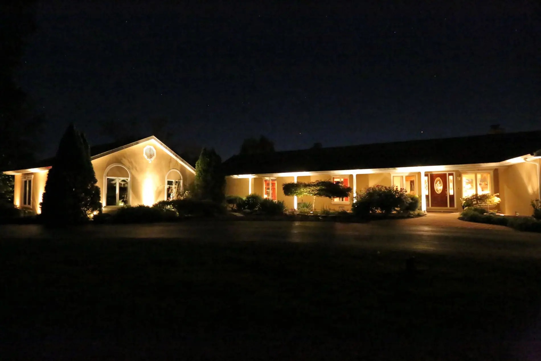 Marco Bros concept — night lighting on a ranch home